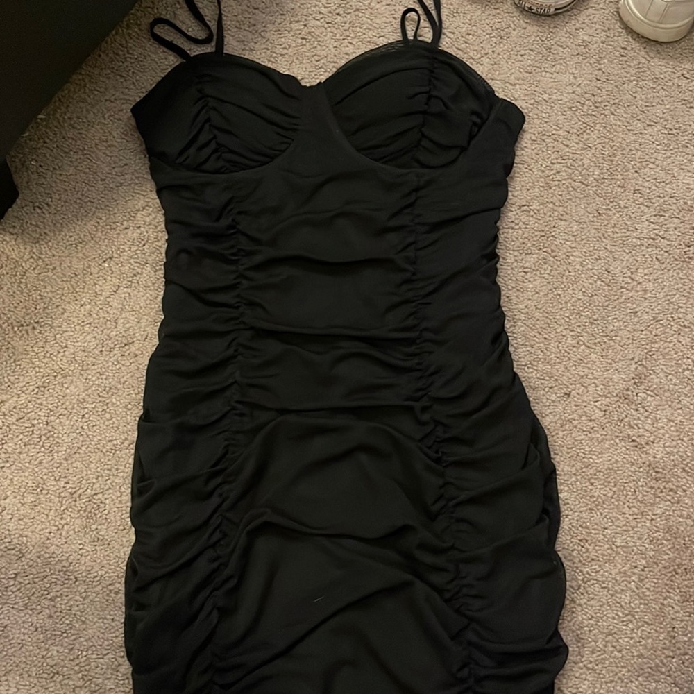 Knee length black ruched dress